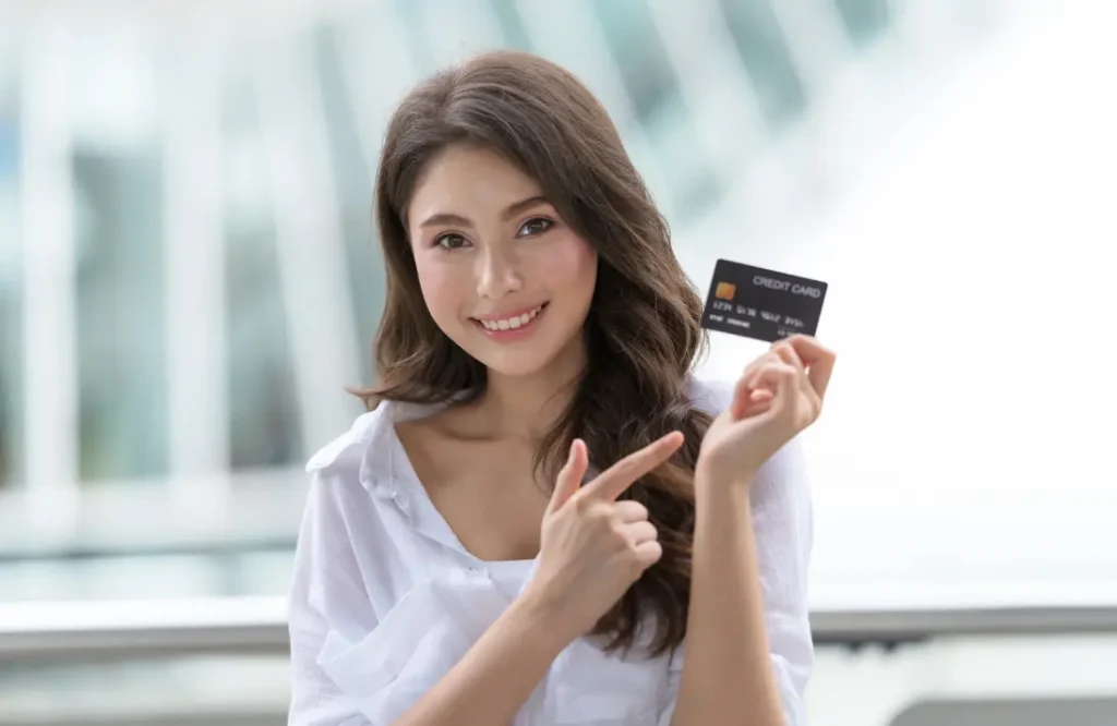 Woman holding credit card